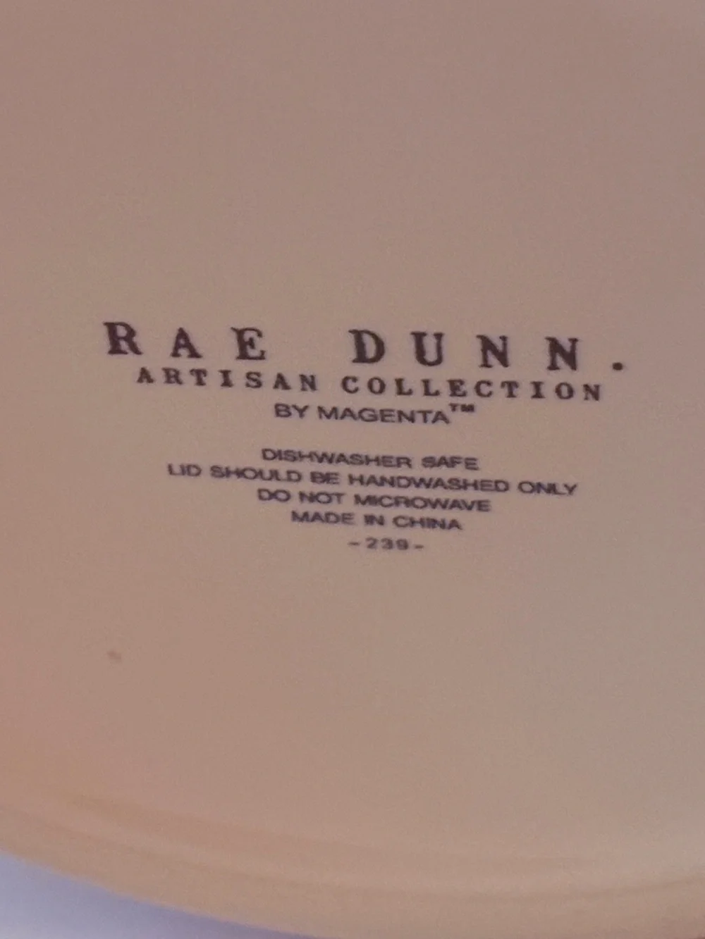 Rae Dunn off White Ceramic 'POT O’GOLD’ Canister with Green Handle covered lid.